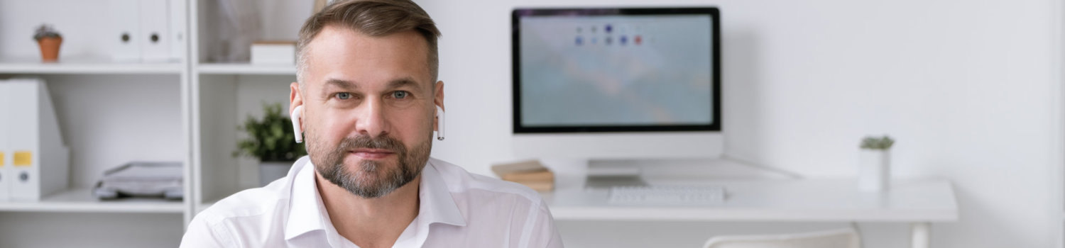 Soundblock Solutions team member answering queries on phone